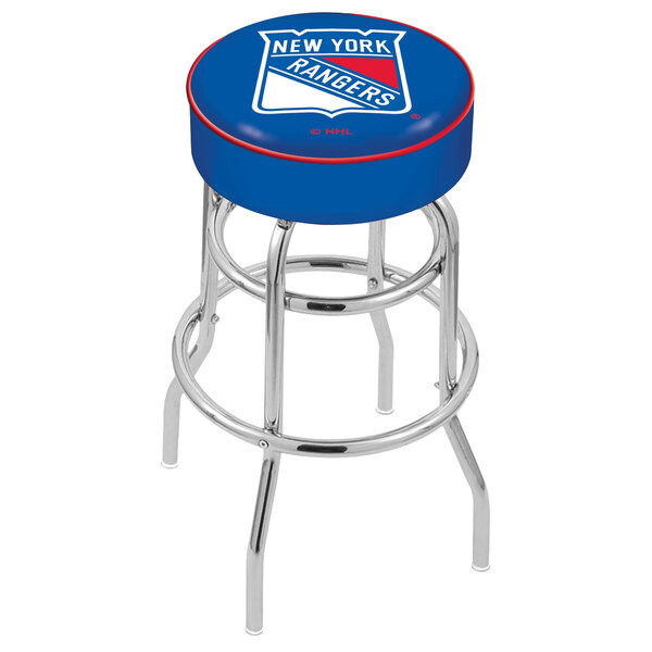 A blue Holland Bar Stool with New York Rangers logo on the seat and back, swiveling over a table.