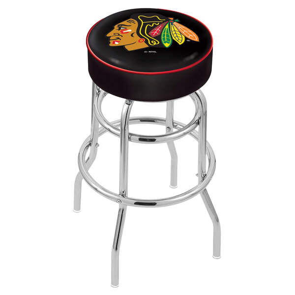 A black and red Holland Bar Stool swivel bar stool with the Chicago Blackhawks logo and hockey puck seat.