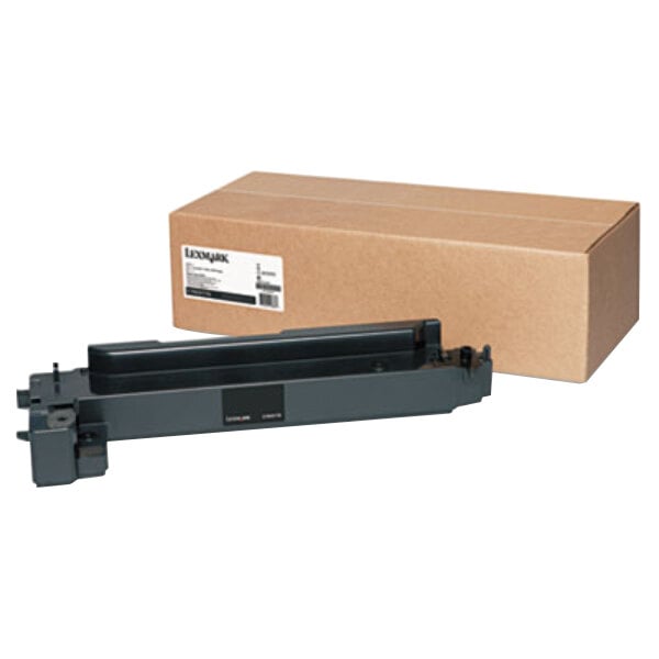 A brown Lexmark waste toner bottle box with a label.