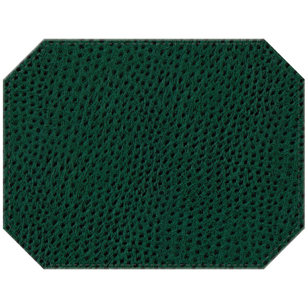 A close up of a green faux leather octagon placemat with black stitching.