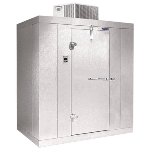 A white metal Norlake walk-in freezer with a door open.