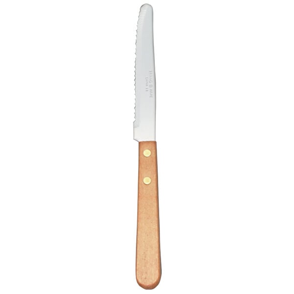 A Libbey stainless steel steak knife with a wooden handle.