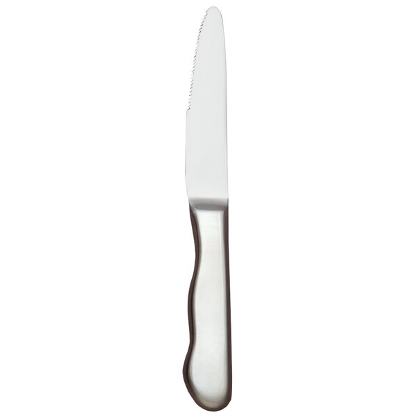A silver steak knife with a hollow white handle.