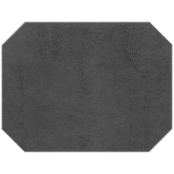 A grey octagon shaped faux leather placemat.