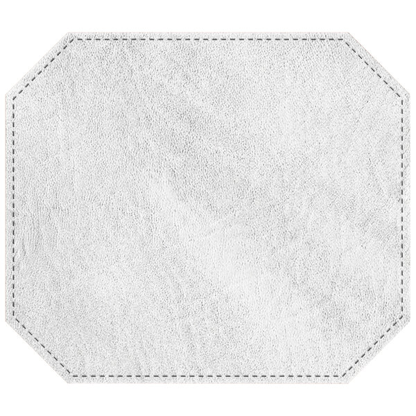A white custom hardboard and faux leather octagon placemat with stitching.