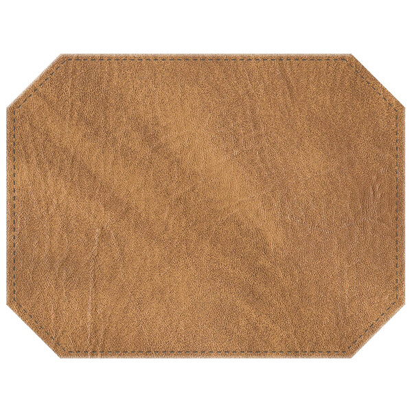 A brown octagon hardboard and faux leather placemat with stitching.
