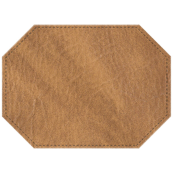 A brown hardboard and faux leather octagon placemat with a customizable leather patch.