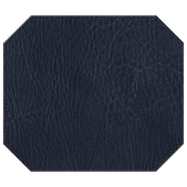 A navy octagon shaped hardboard and faux leather mat with stitching.