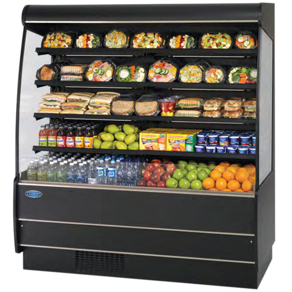 A black Federal Industries air curtain merchandiser with shelves of food including green apples, oranges, and plastic bottles.