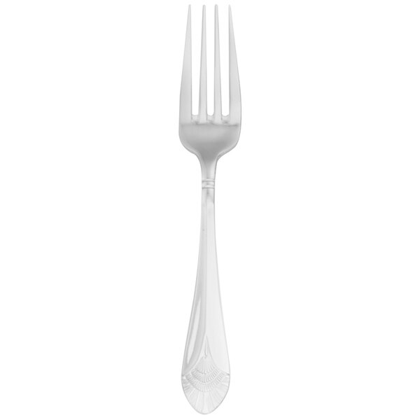 A silver Walco stainless steel dinner fork with a white background.