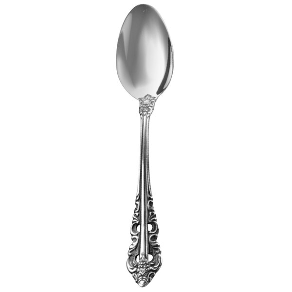 A Walco 6801 Classic Baroque stainless steel teaspoon with an ornate design.