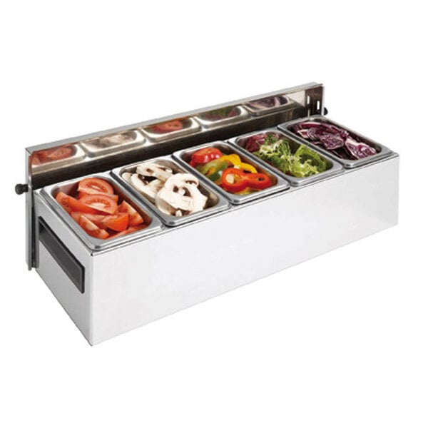 A Matfer Bourgeat stainless steel condiment bar with 5 compartments holding different types of vegetables.