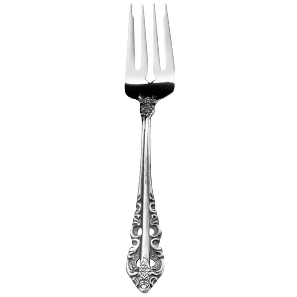 A close-up of a Walco stainless steel salad fork with a Baroque handle.