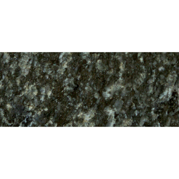 A close-up of a black and white speckled Uba Tuba granite table top.