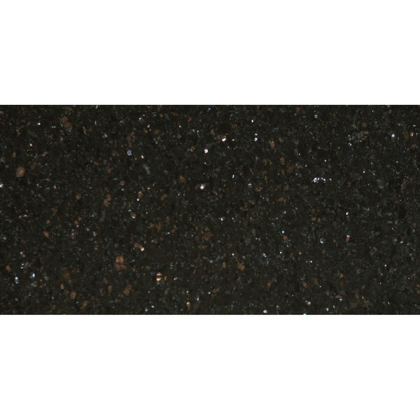 A close-up of a black granite table top with black and white specks.