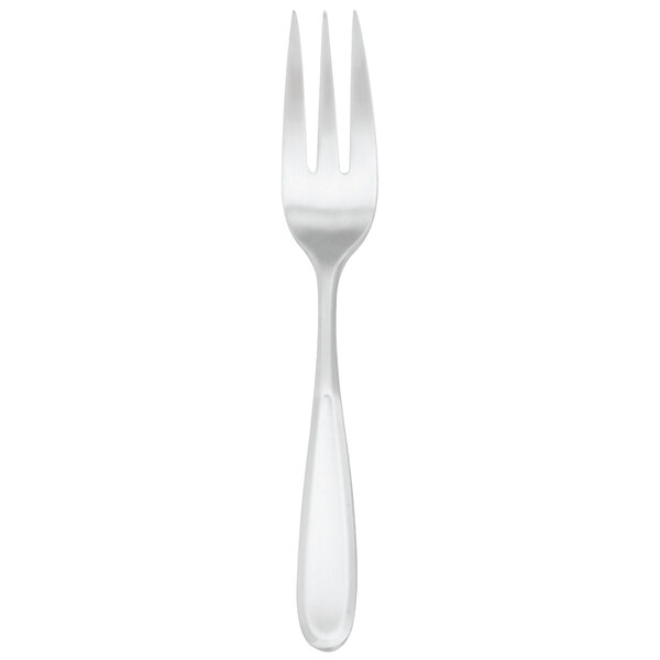 A silver Walco Modernaire table fork with a white handle.