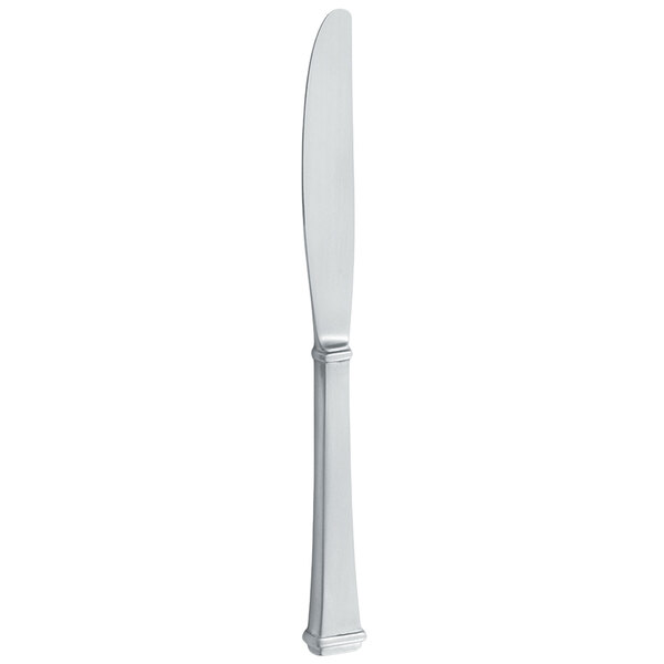 A Walco Farmington stainless steel butter knife with a solid handle.