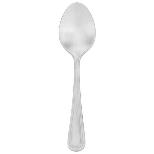 A Walco stainless steel demitasse spoon with a silver handle on a white background.