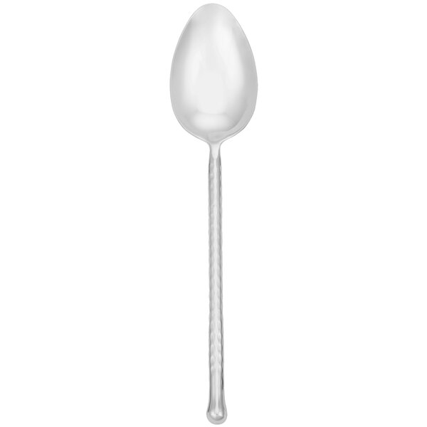 A silver Walco Riptide serving spoon with a long handle.