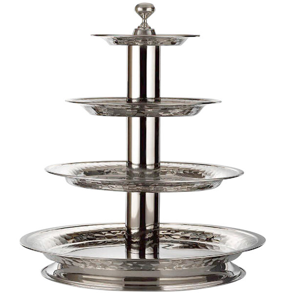 A Bon Chef stainless steel 4-tier stand on a table.