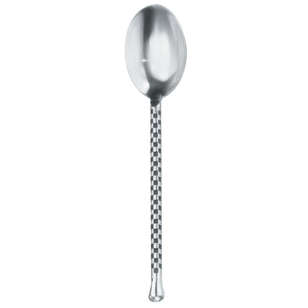 A close up of a Walco stainless steel teaspoon with a long handle.