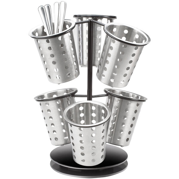 A black metal Cal-Mil revolving caddy with six metal cylinder containers holding flatware.