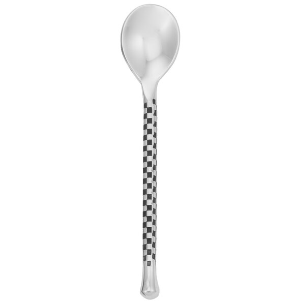 A Walco stainless steel demitasse spoon with a checkered handle.