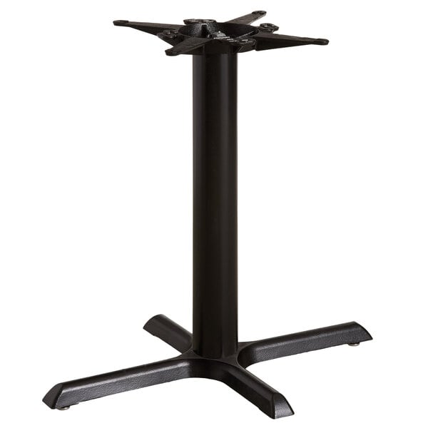 A black Lancaster Table & Seating cast iron table base with a metal stand.