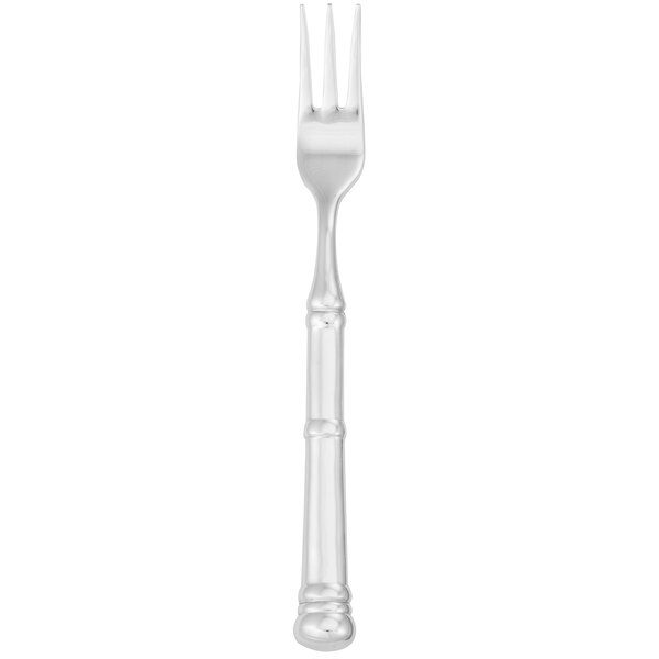 A Walco Soprano stainless steel cocktail fork with a silver handle.
