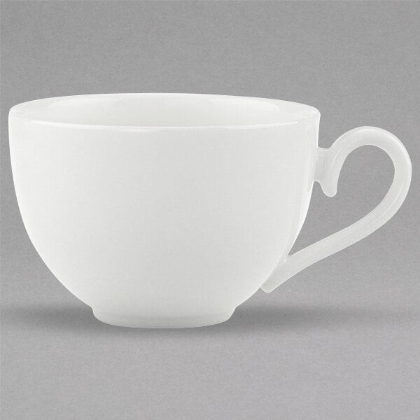 A white Villeroy & Boch bone porcelain cup with a handle.