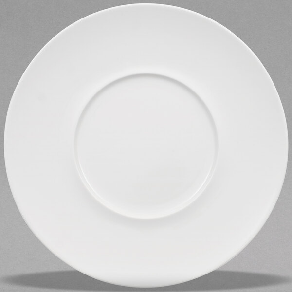 A Villeroy & Boch white bone porcelain flat plate with a round edge and a round center.