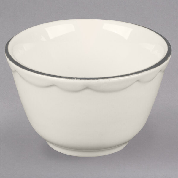 A white bowl with a black rim.