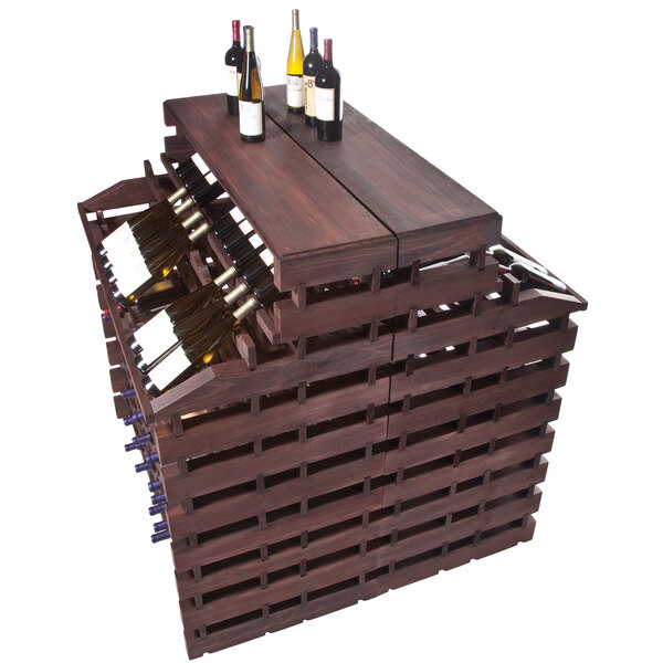 A Franmara stained wooden wine rack with bottles on top.