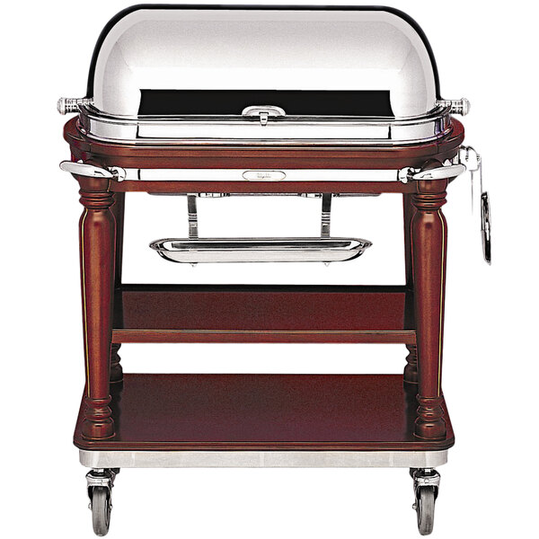 A mahogany Bon Chef buffet cart for outdoor catering.