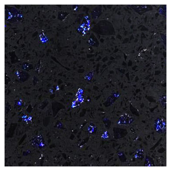 A black surface with blue specks.