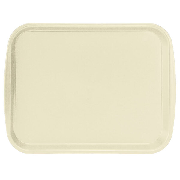 A beige rectangular Vollrath plastic tray with built-in handles.