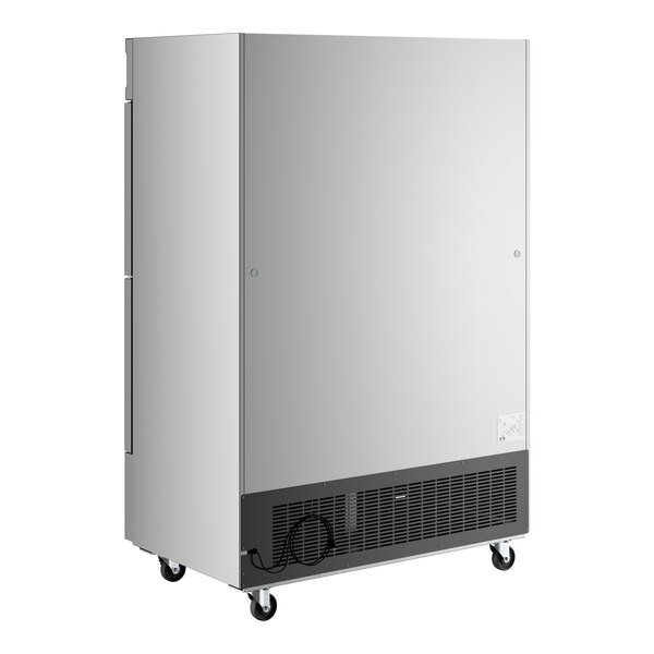 A stainless steel commercial reach-in freezer with solid half doors and caster wheels.