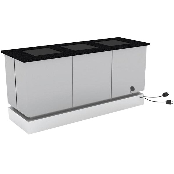 A stainless steel rectangular buffet table with black induction ranges on top.