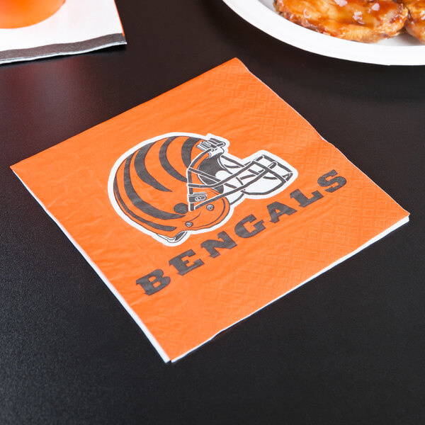 A Cincinnati Bengals luncheon napkin on a table.