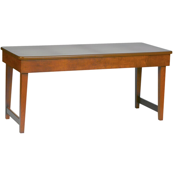 A brown rectangular Bon Chef wooden banquet table with legs.