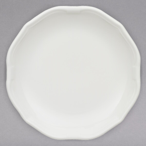 A white Villeroy & Boch porcelain flat plate with a rim.