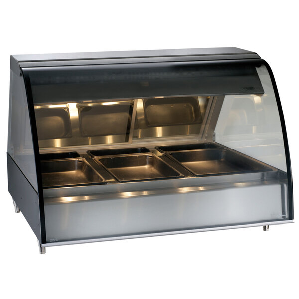 An Alto-Shaam black countertop heated display case with curved glass and three food trays inside.