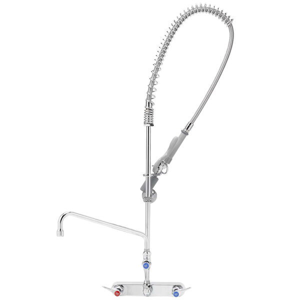 A silver T&S wall-mounted pre-rinse faucet with a stainless steel hose.