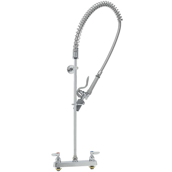 A T&S chrome deck mounted pre-rinse faucet with a hose.