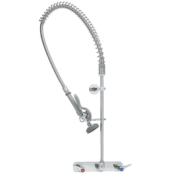 A T&S chrome wall mounted pre-rinse faucet with a hose.