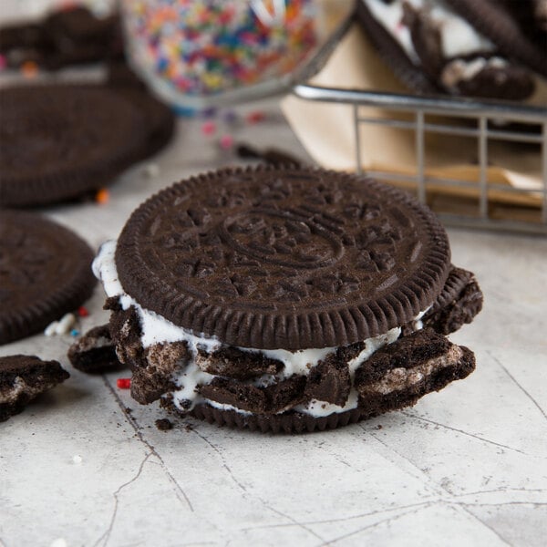 A Nabisco Oreo ice cream wafer with chocolate cookies and white cream.