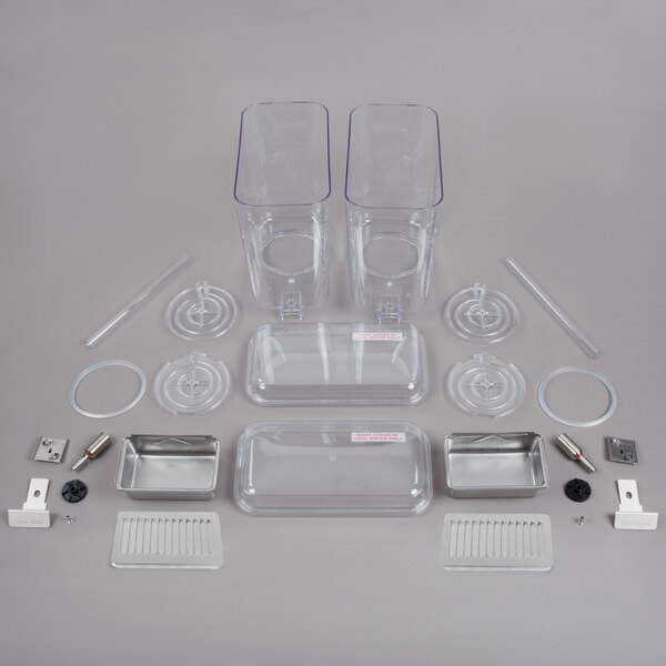 A Crathco double clear plastic container and drip tray assembly kit.