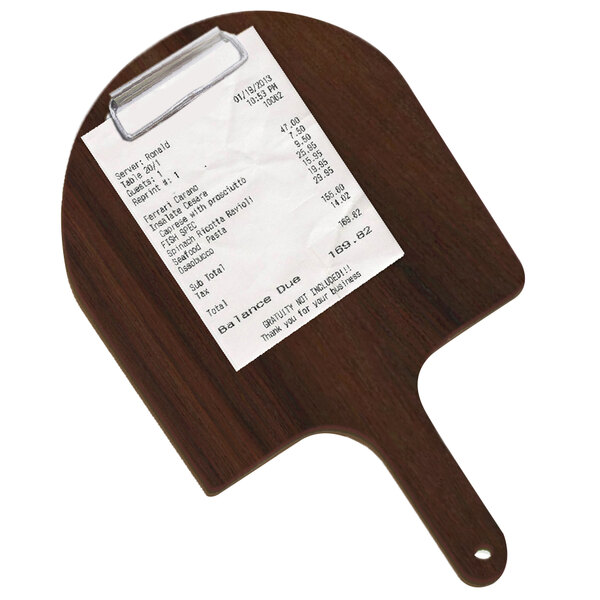 A paper on a walnut Menu Solutions pizza peel clipboard.