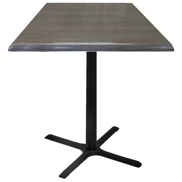 A Holland Bar Stool charcoal outdoor table with a black cross base and square top.