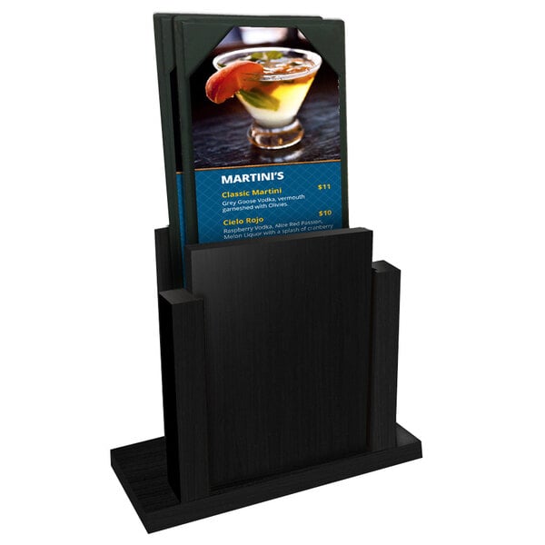 A black wood menu holder with a menu on it.